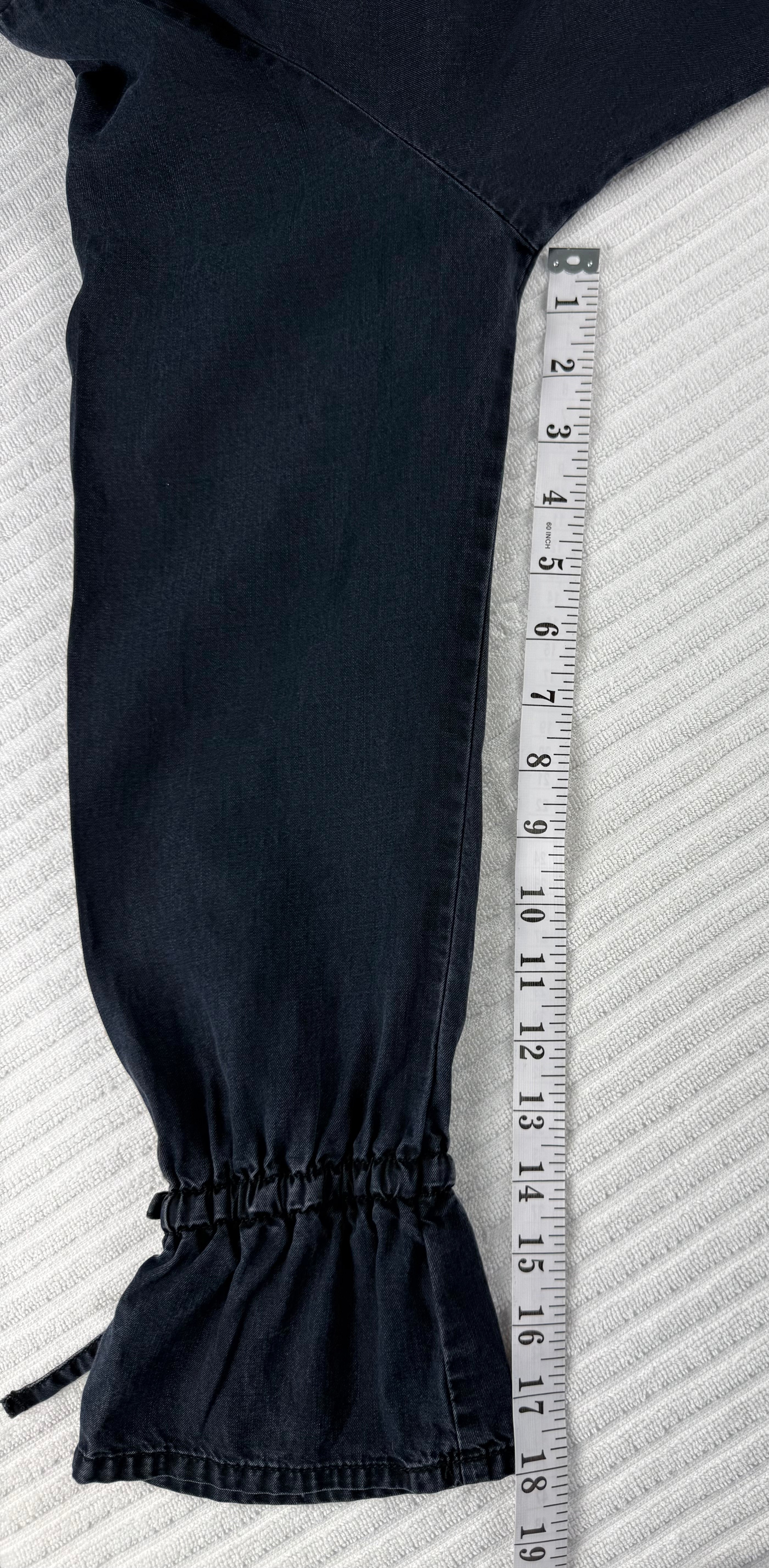 Sandwich Denim Studio Amsterdam charcoal 100% Tencel shirt with stunning hand-applied blue crystal collar embellishment and ruffle cuff detail at Blue Sparrow Shop measuring 18" sleeve