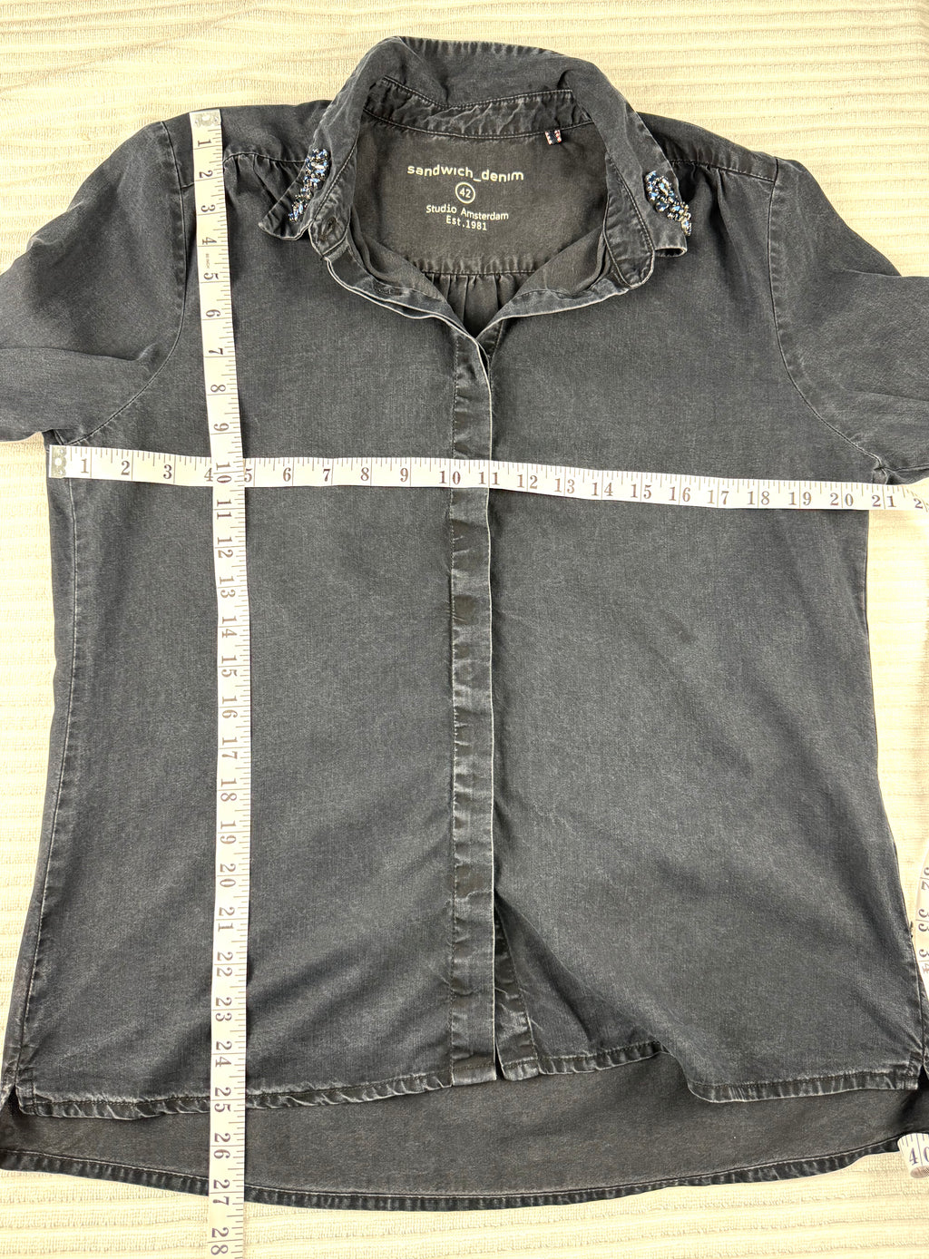 Sandwich Denim Studio Amsterdam charcoal 100% Tencel shirt with stunning hand-applied blue crystal collar embellishment and ruffle cuff detail at Blue Sparrow Shop measuring 42" bust and 25-27" shoulder to hem 