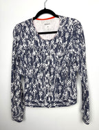Sandwich blue white ikat print cotton stretch jacket button front cropped blazer women size large with flap pockets and long sleeves.