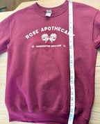 Schitts Creek Rose Apothecary sweatshirt measuring 25" from shoulder to hem