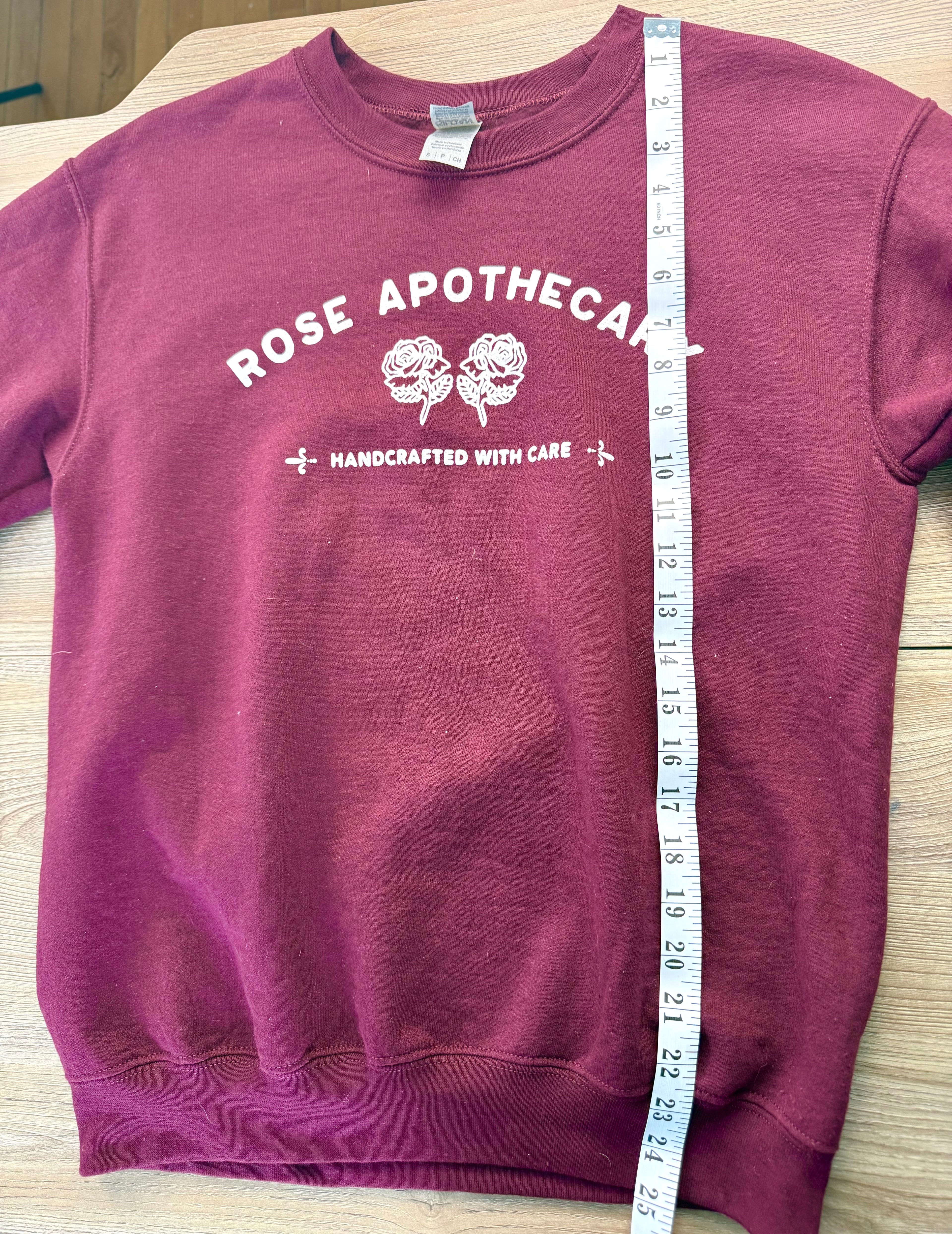 Schitts Creek Rose Apothecary sweatshirt measuring 25" from shoulder to hem 2