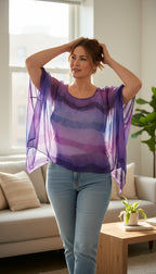 Sheer Batwing Poncho Top | One Size at Blue Sparrow Resale Shop on woman with jeans on by window