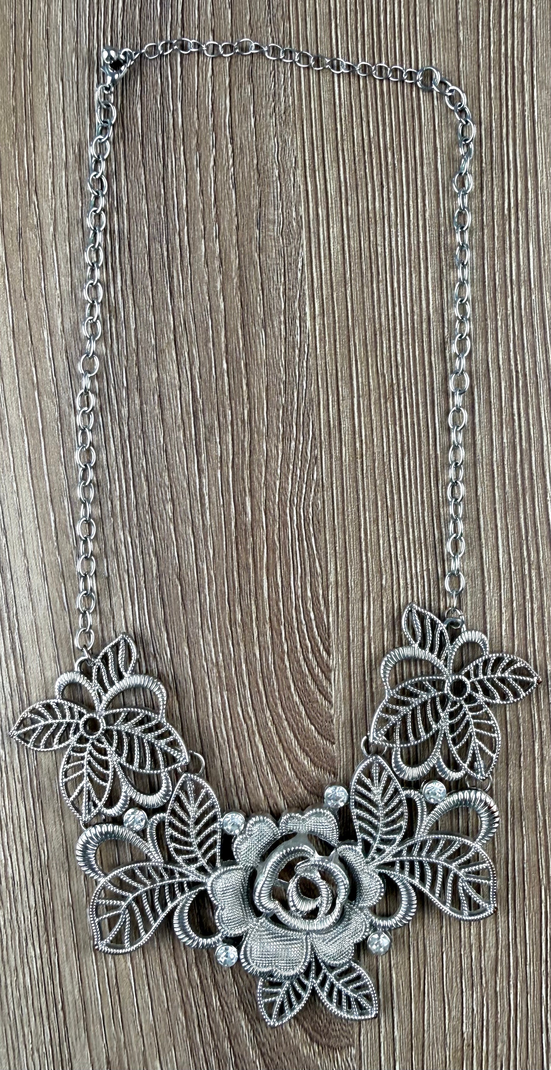 Silver-tone filigree rose bib necklace at Blue Sparrow Shop