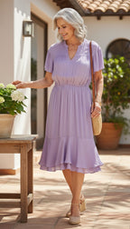 Vera Wang Lavender Dress | Size M at Blue Sparrow Shop on woman outdoors 