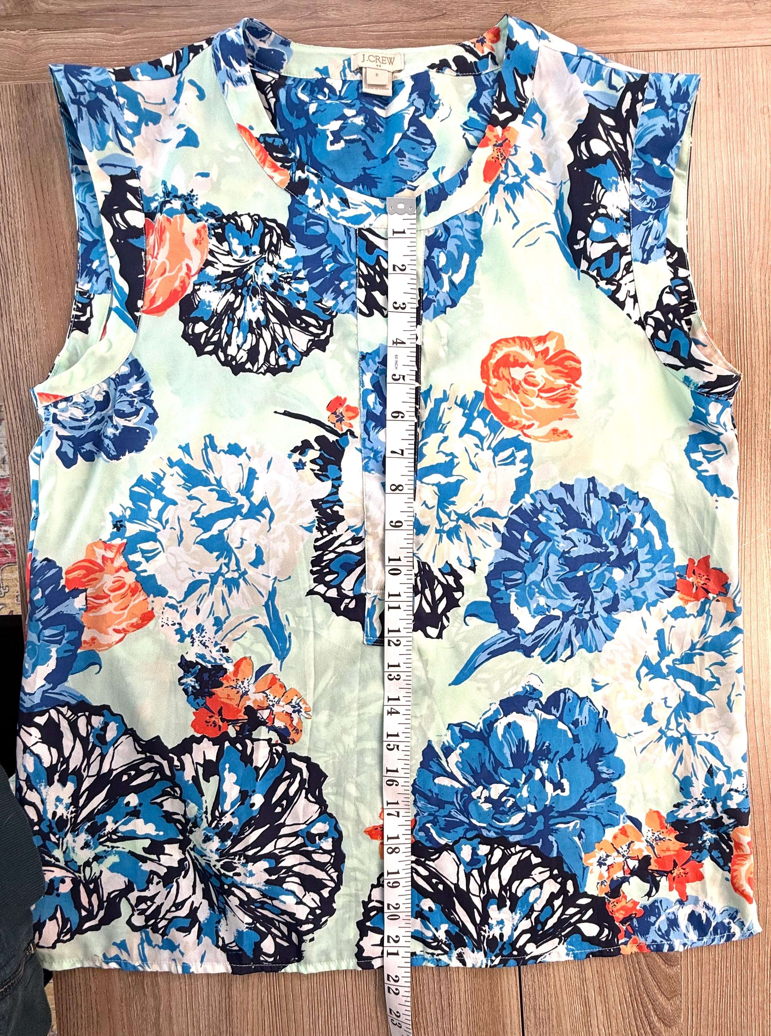 Blue Floral Sleeveless J Crew top measuring 21.5" from neckline to hem
