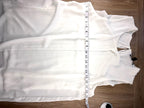 Sleeveless tunic top measuring 38" bust 