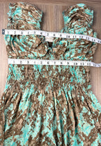 Smocked peasant dress measuring 30" bust and 24" waist elastic not extended 