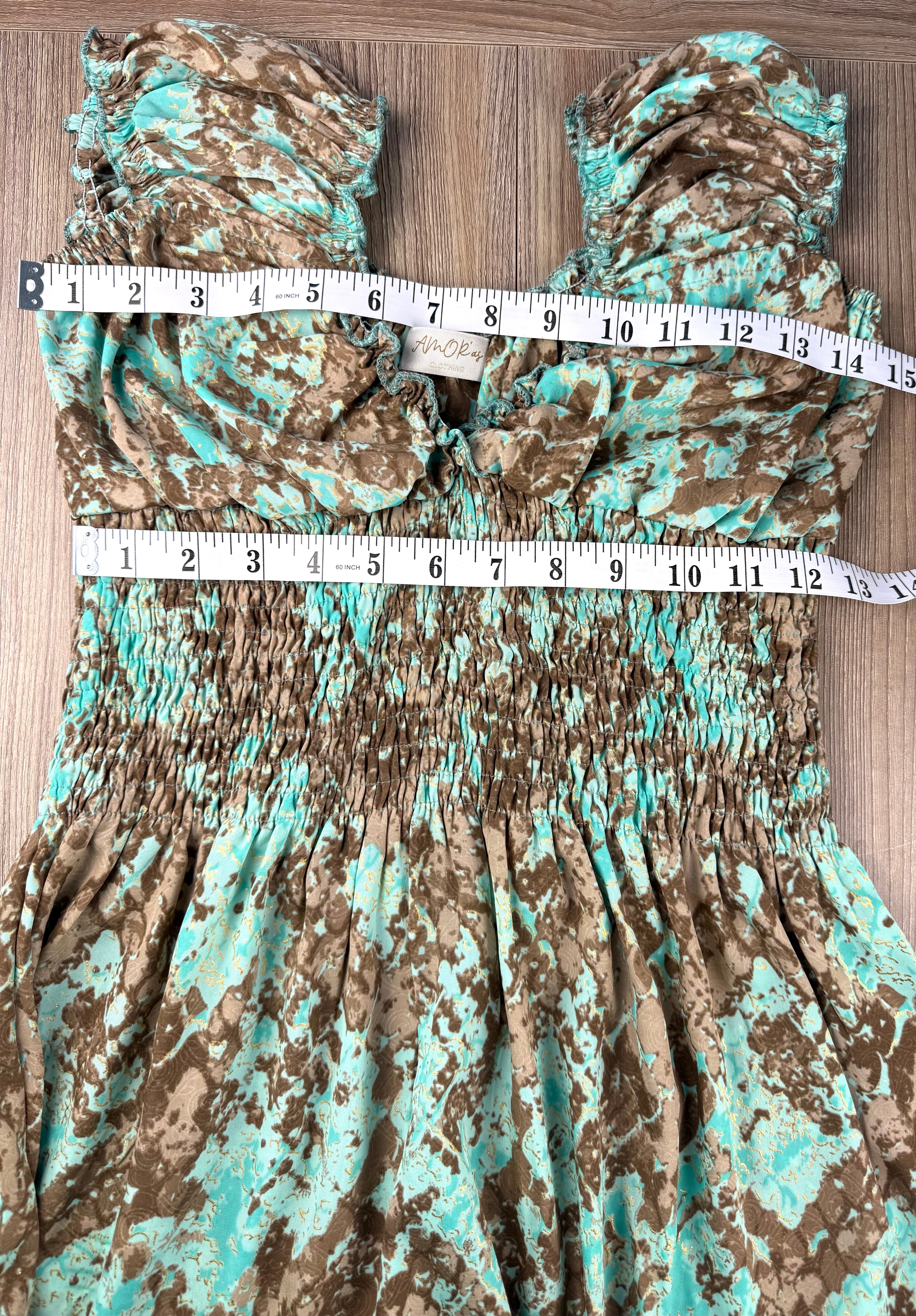 Smocked peasant dress measuring 30" bust and 24" waist elastic not extended 
