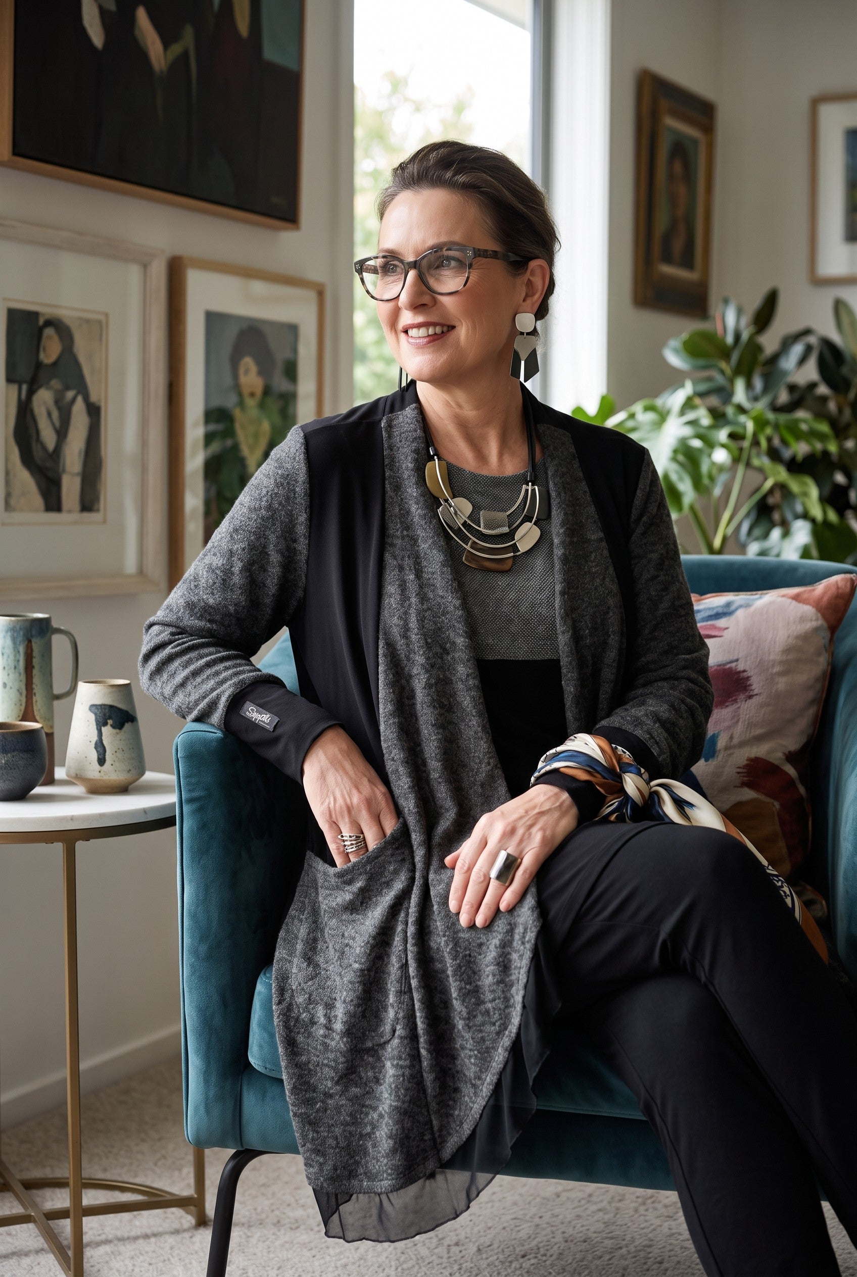 Sympli Made in Canada Black & Grey Mixed Media Long Cardigan | Size 10 on woman sitting in livig room 