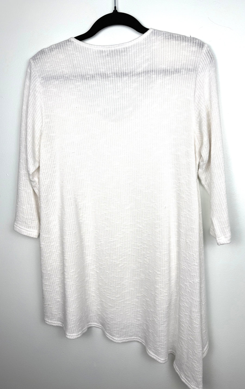 back of Sympli Made in Canada White Asymmetrical Tunic Top | Rib Knit Stretch Travel Top on hanger