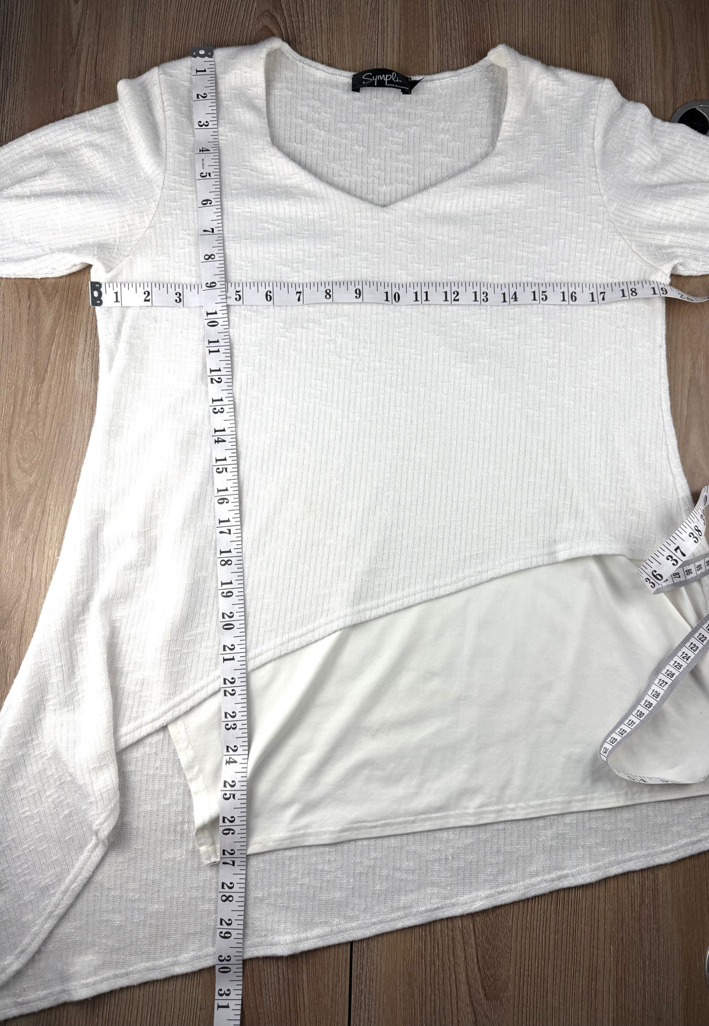 Sympli Made in Canada White Asymmetrical Tunic Top | Rib Knit Stretch Travel Top measuring 38" bust and from 27 - 30" hem depending on where it falls 