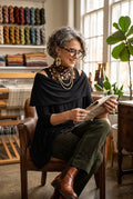 Sympli cold shoulder cowl neck top  on woman reading