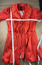 THX Merci Collection Red Ruffle Trench Coat measuring 38" bust  and 31" shoulder to hem  
