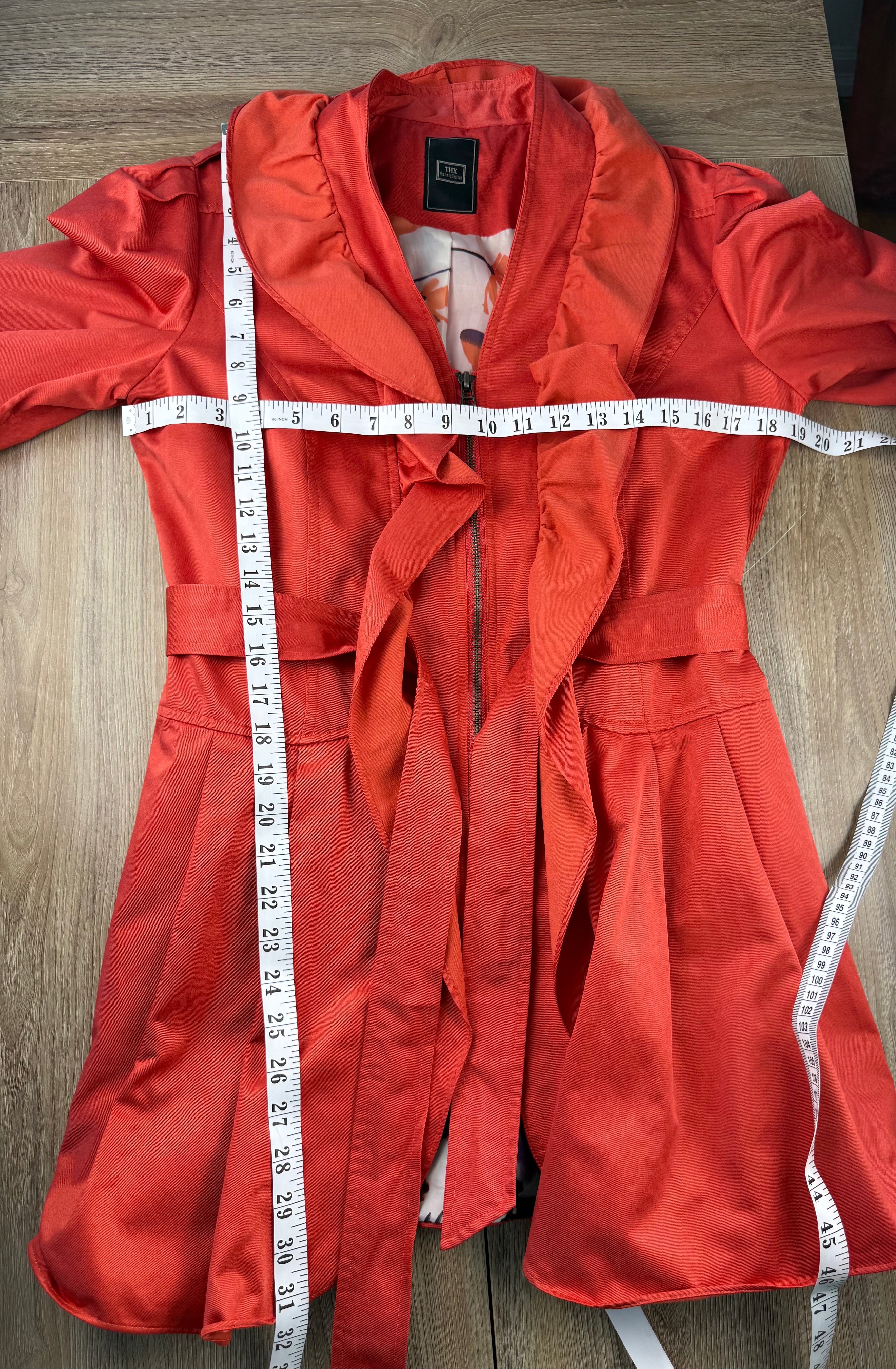 THX Merci Collection Red Ruffle Trench Coat measuring 38" bust  and 31" shoulder to hem  