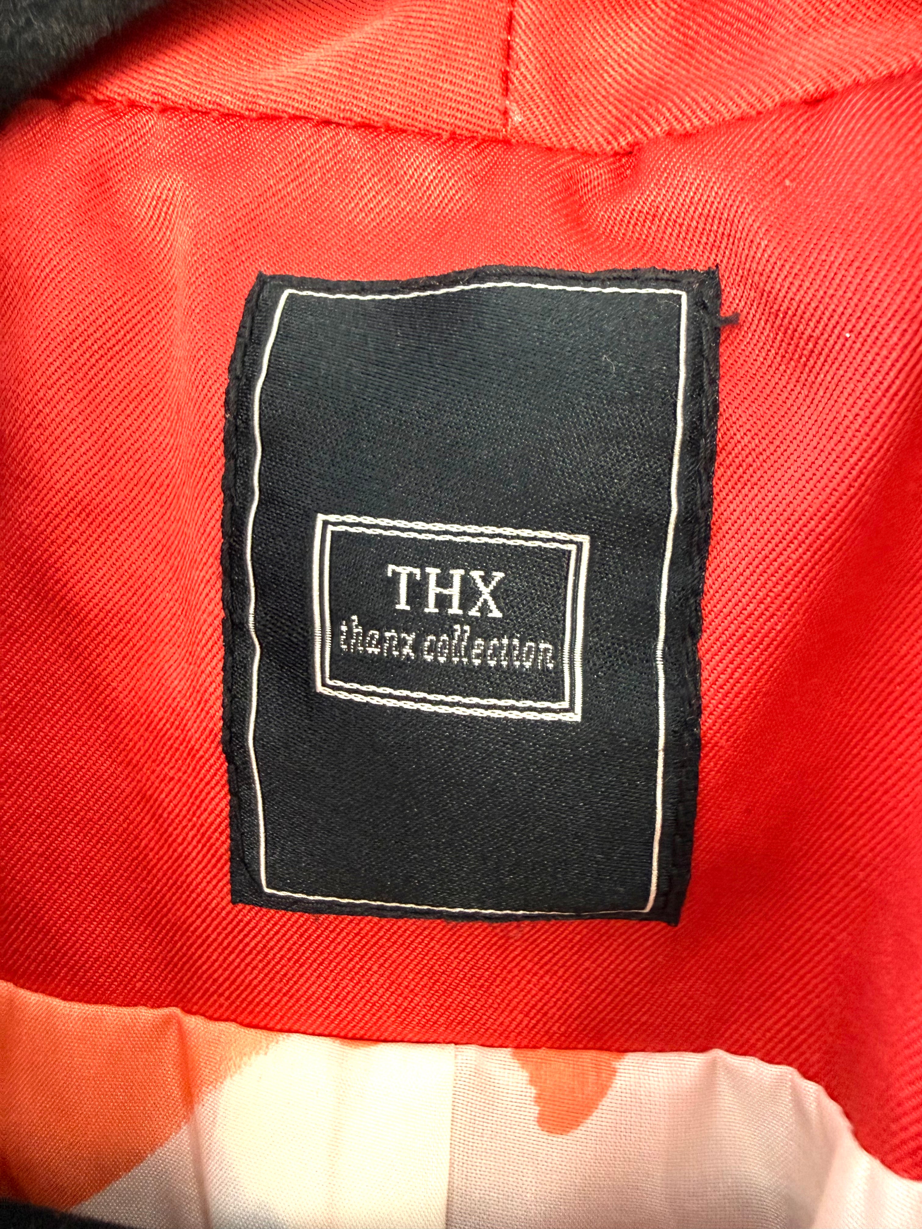 THX label inside THX Merci Collection ruffle trench coat jacket