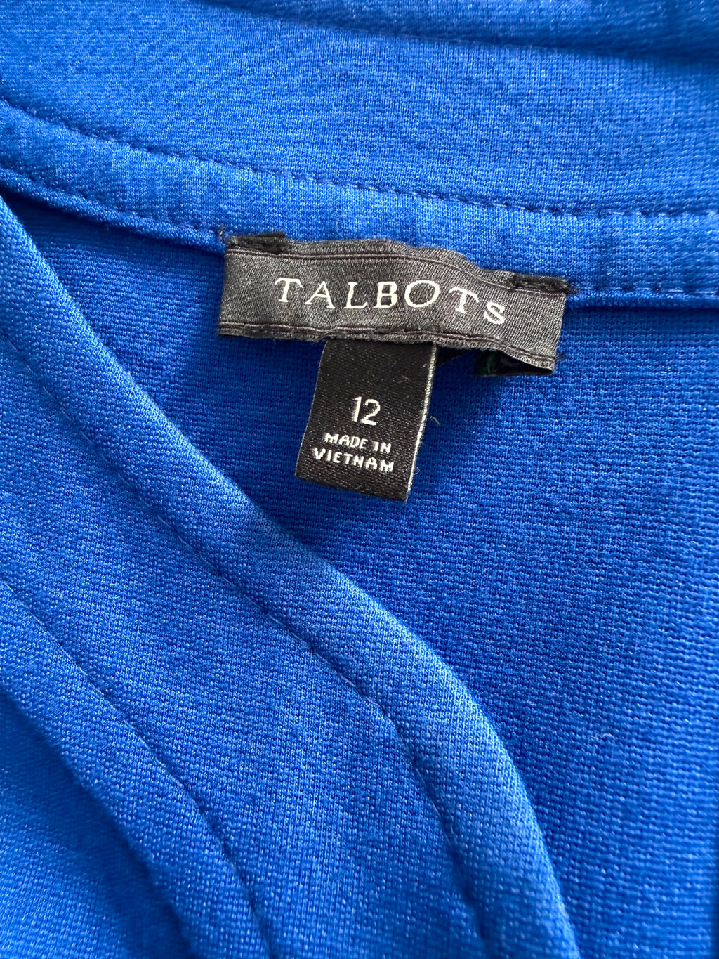 Talbots size 12 label detail inside royal blue dress.