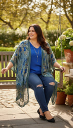Torrid Sheer Floral Burnout Kimono Duster | Plus Size at Blue Sparrow Shop on woman sitting on bench outside 