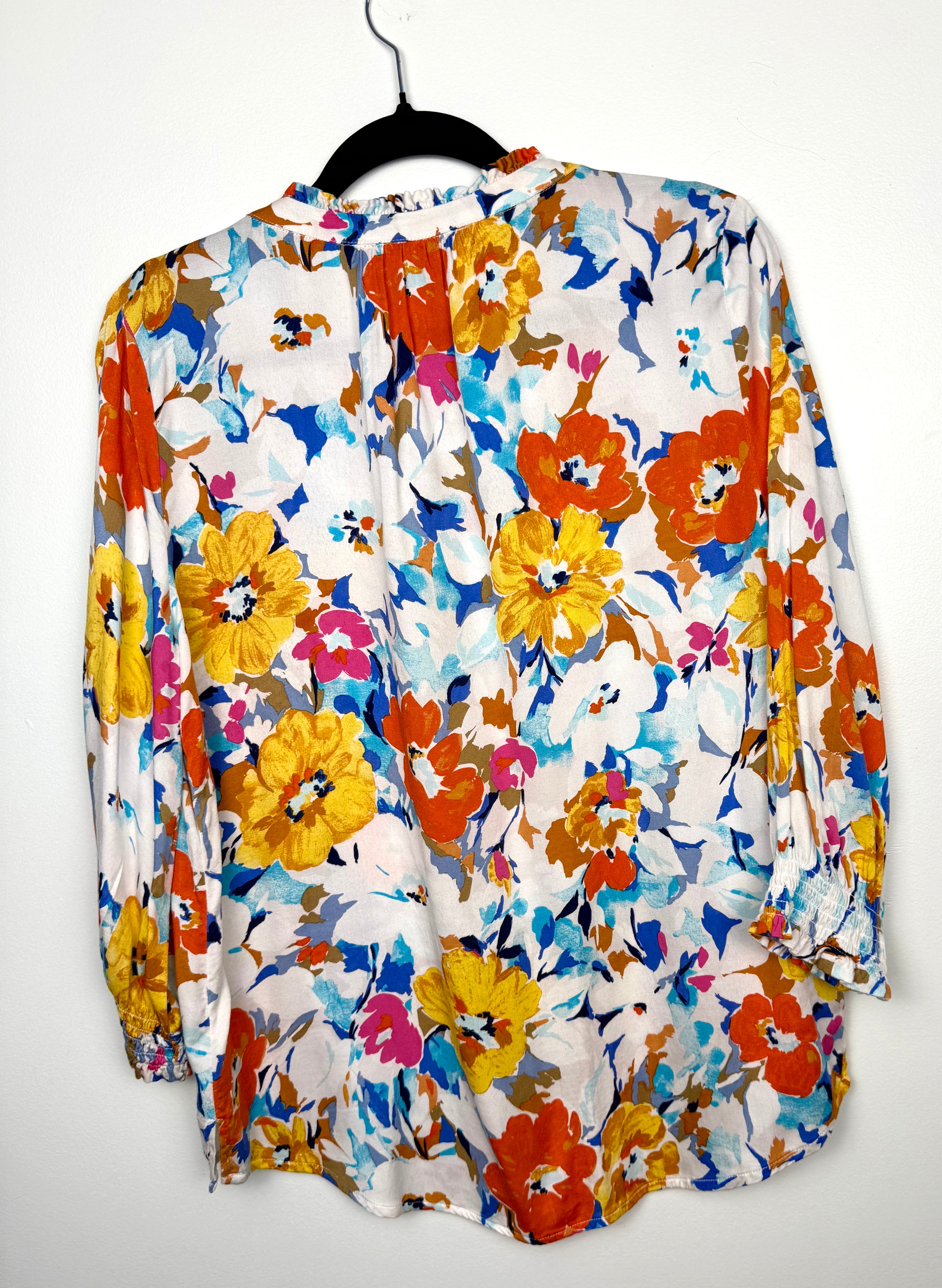 Tribal floral spring top back view on hanger