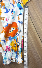 Tribal floral spring top measuring 12" sleeve 
