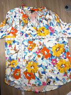 Tribal floral spring top measuring 40" bust and 25" shoulder to hem