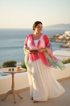 Tropical Sheer Wrap | Cover-Up | One Size at Blue Sparrow Shop on woman wearing long white skirt at the beach