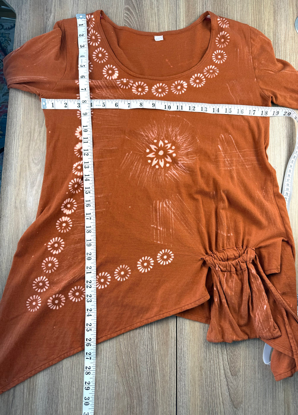 Tye dye boho artsy unique asymmetrical top in burnt orange  measuring 36" bust and 26-31" shoulder to hem 