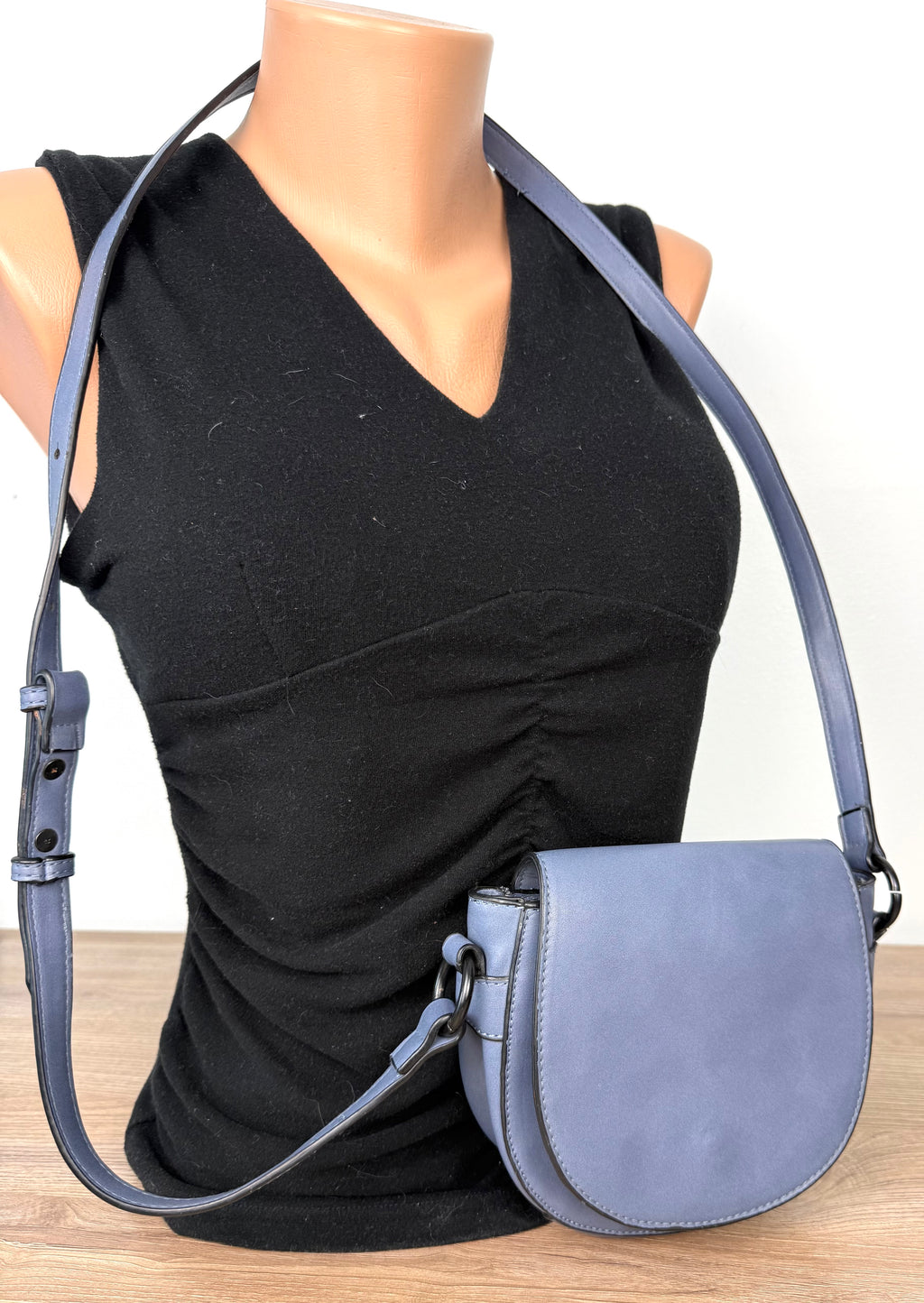 Vegan Leather Blue Grey Saddle Crossbody Bag at Blue Sparrow Shop  on mannequin to show size