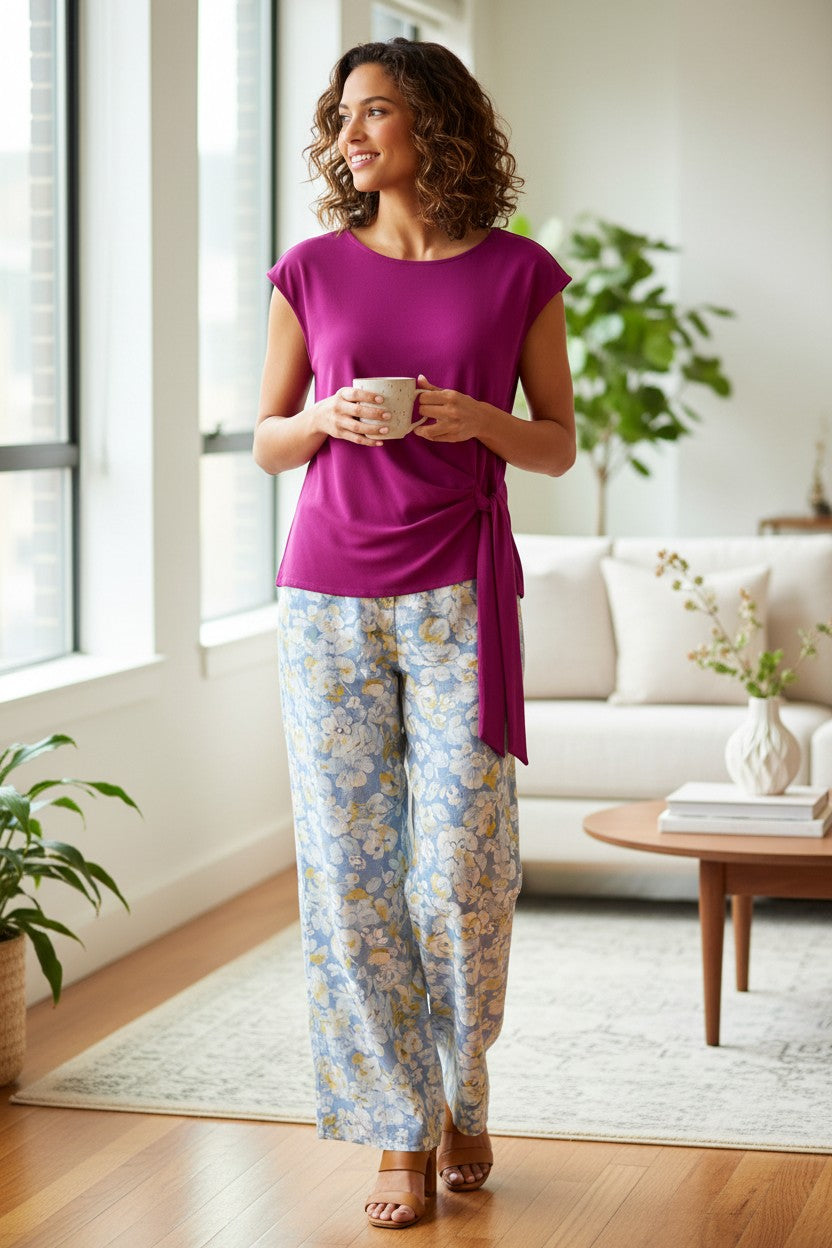 Vince Camuto Magenta Draped Side Top | Size M  at Blue Sparrow Shop  on white background on woman holding coffee cup in living room 