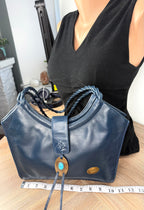 Vintage Leather Purse by LAND measuring about 10" 