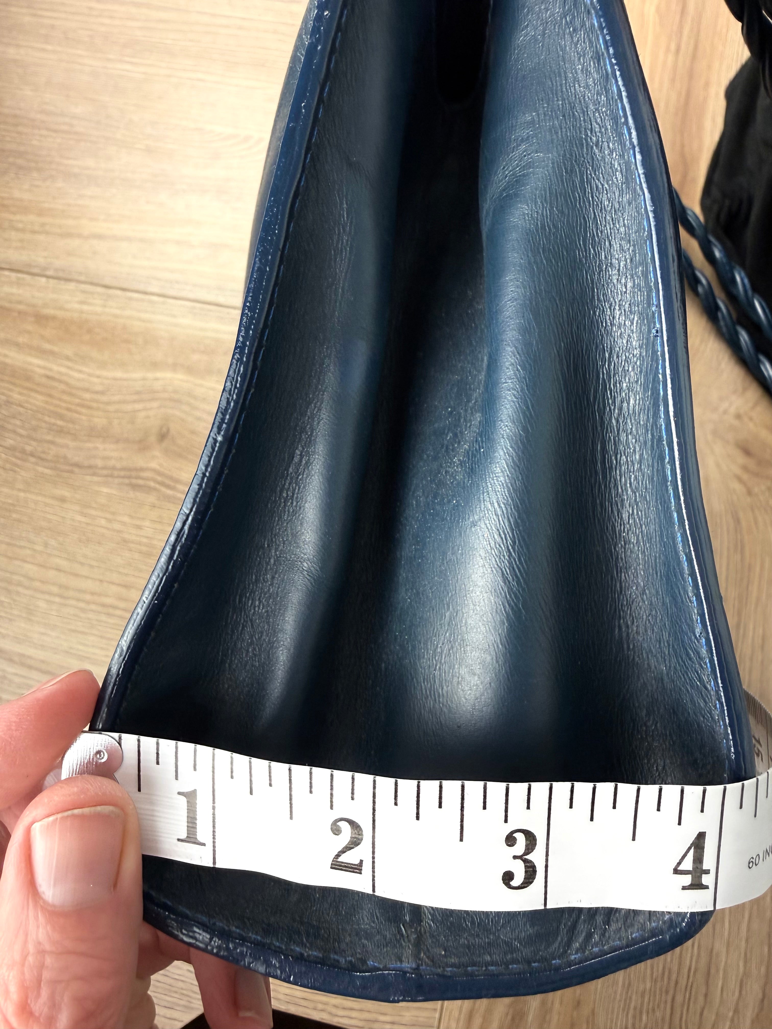 Vintage Leather Purse by LAND measuring about 4" deep