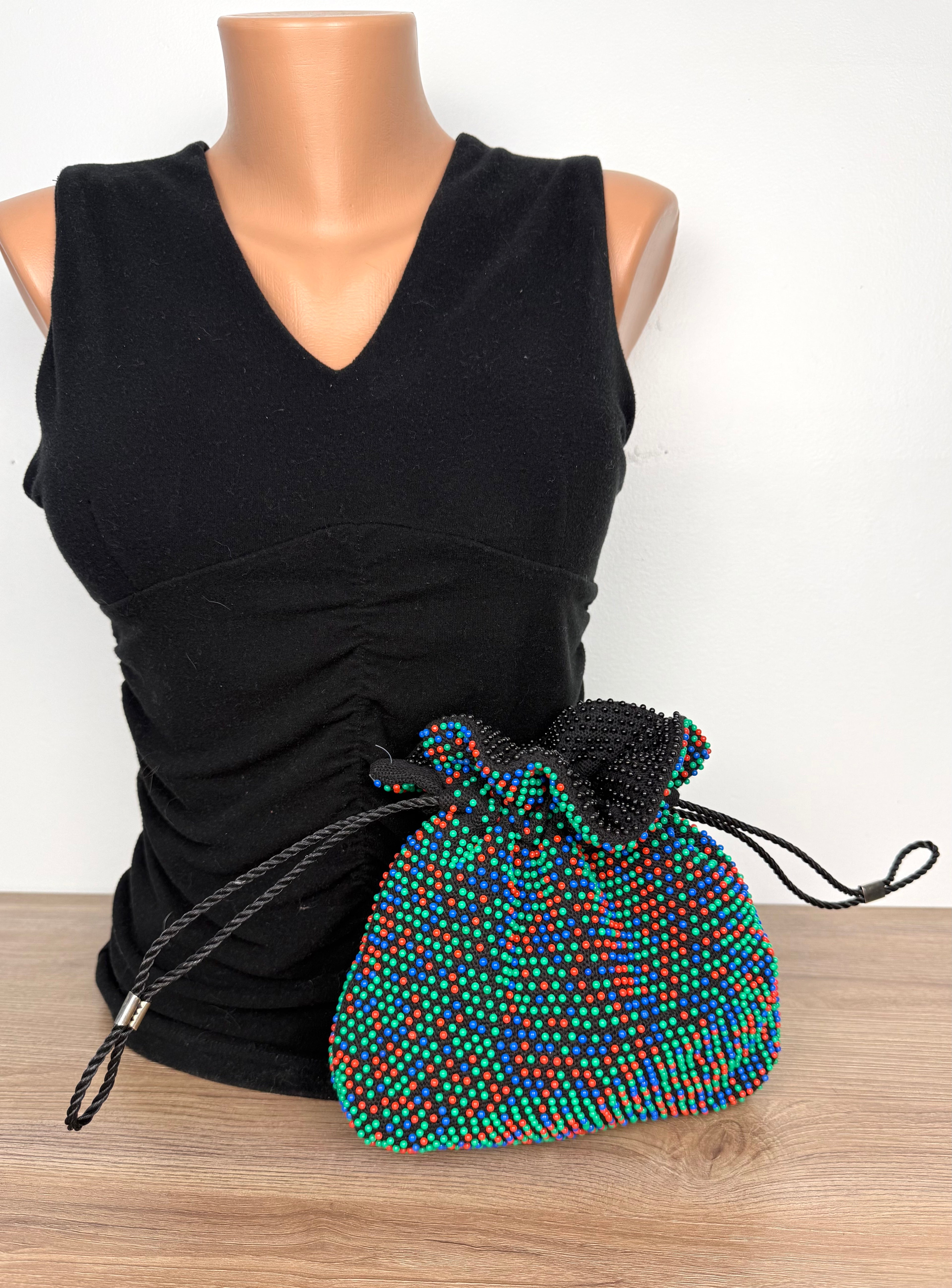 Vintage Reversible Beaded Drawstring Pouch Bag on mannequin to show size