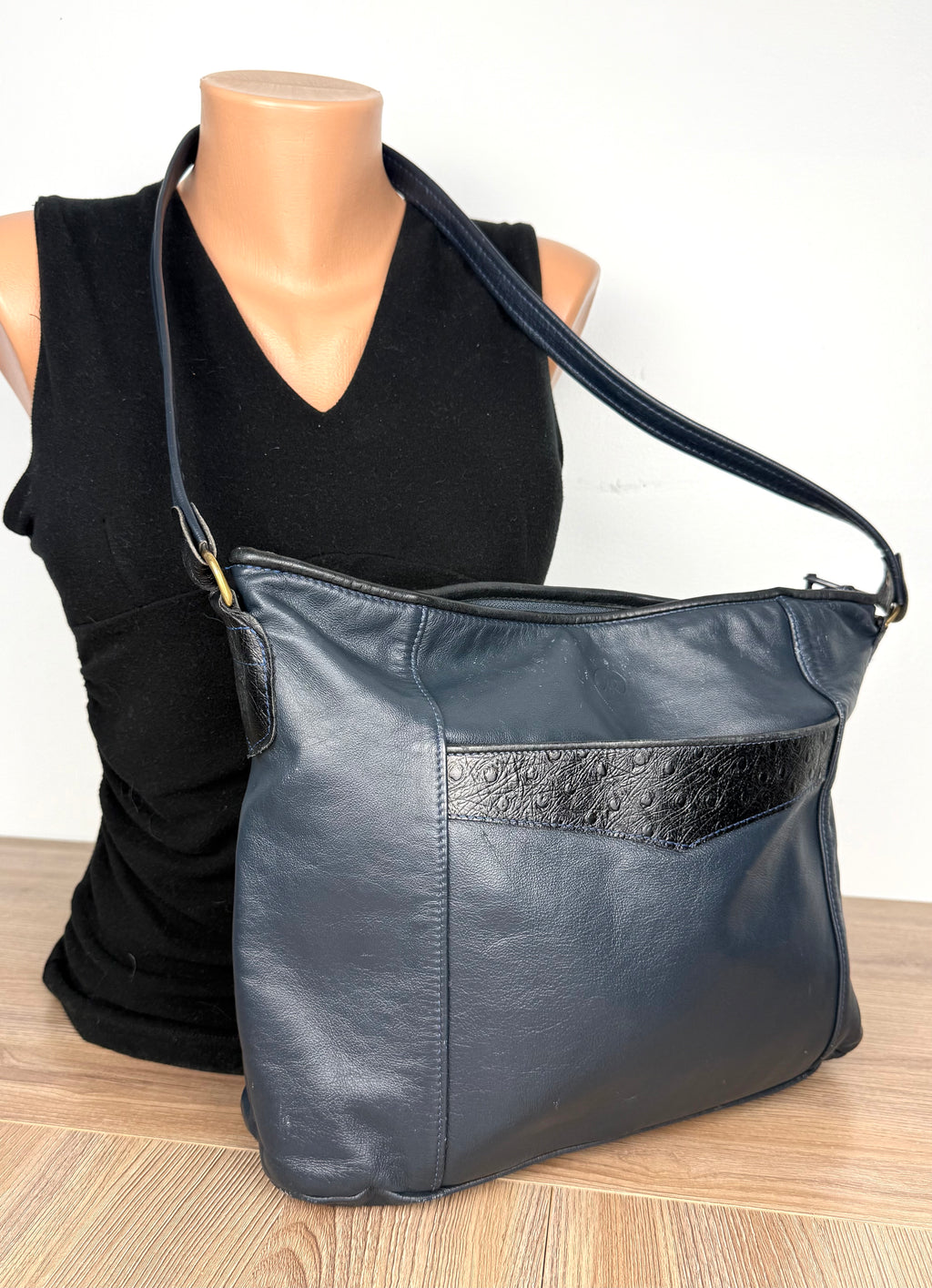 Vintage Rowland Leather Shoulder Bag in Navy Blue on mannequin to show size 