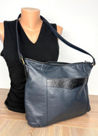 Vintage Rowland Leather Shoulder Bag in Navy Blue on mannequin to show size 