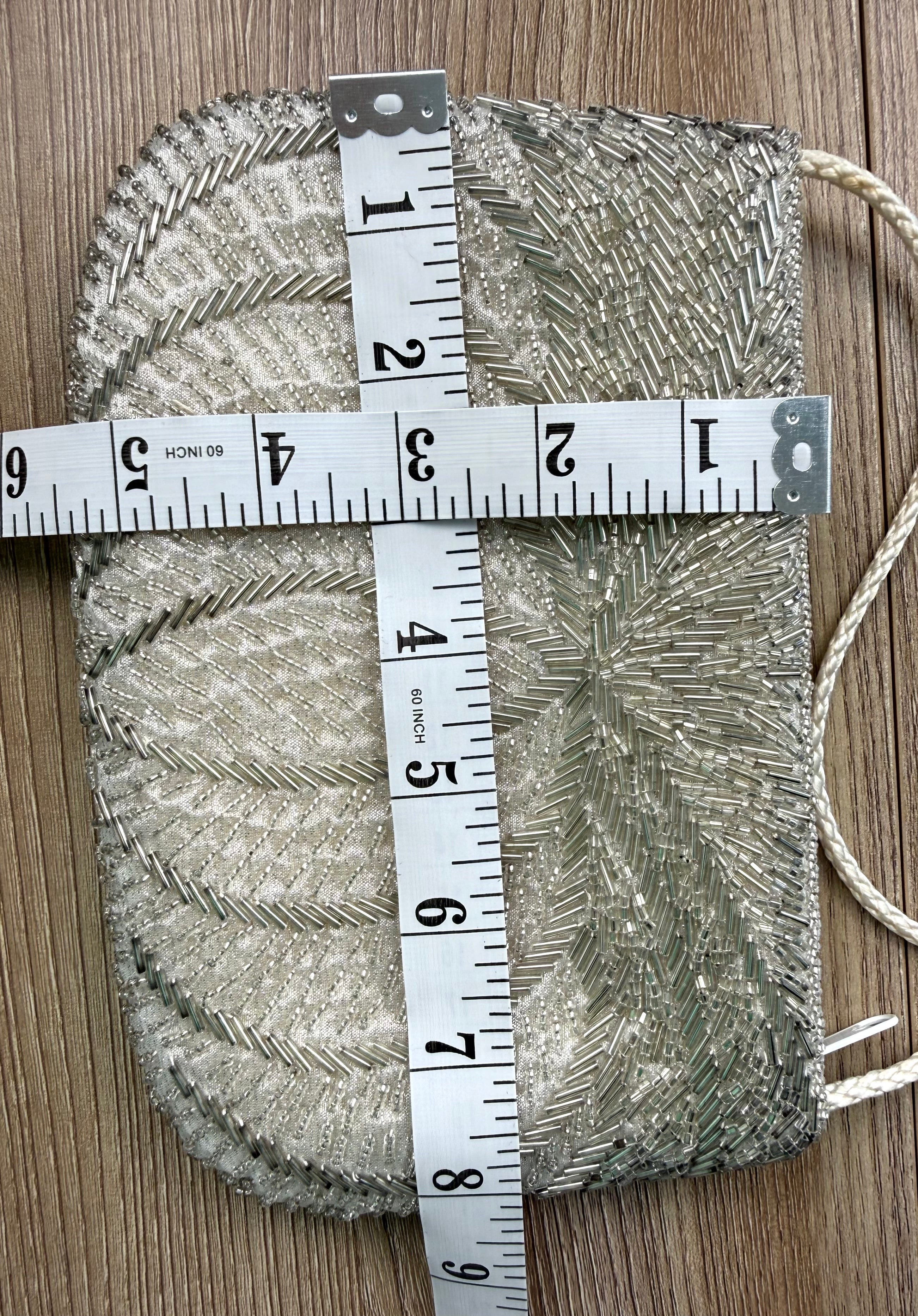 Vintage Silver Beaded Evening Bag at Blue Sparrow Shop Resale Reimagined  measuring 8" by 5.5" 