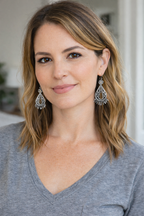 Vintage Style Filigree Dangle Earrings at Blue Sparrow Shop on model 
