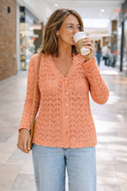Vintage looking Crochet Hand Knit Cardigan at Blue Sparrow Shop on woman drinking coffee