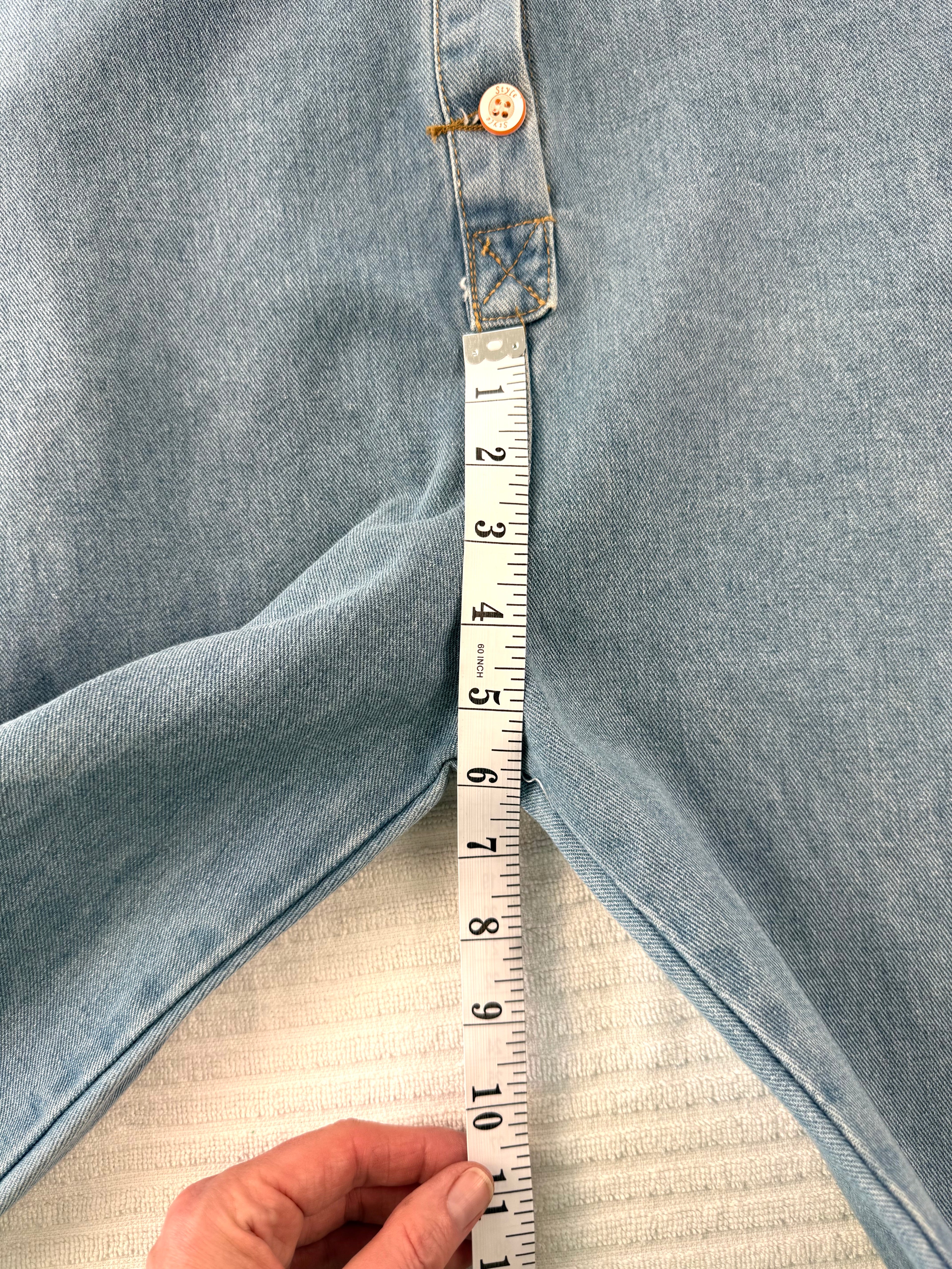 Vintage looking Mechanic Style Denim Coveralls at Blue Sparrow Shop measuring 6" rise from bottom of buttons to crotch