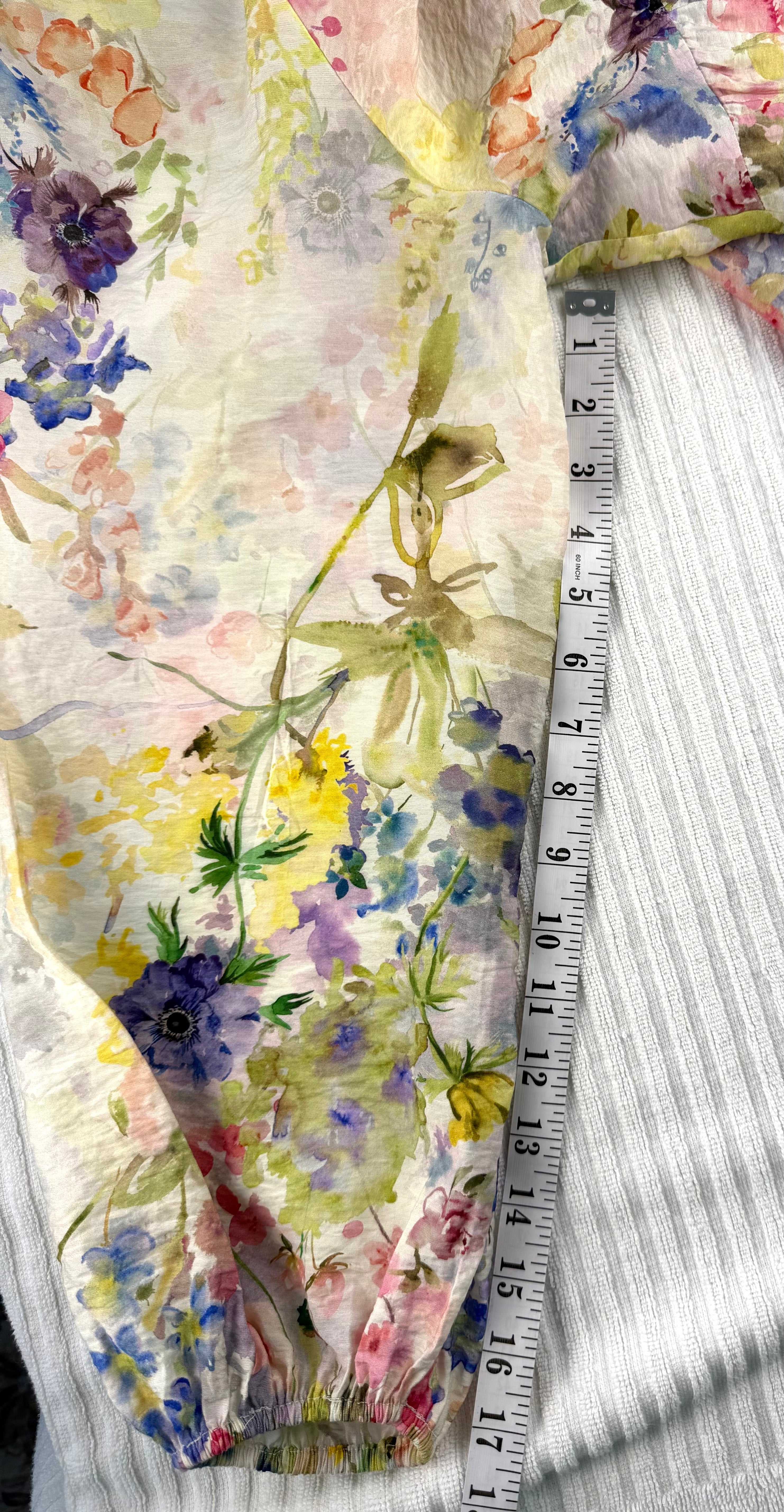 Watercolour Boho Babydoll Mini Dress | Size M at Blue Sparrow Shop measuring 17" sleeve 