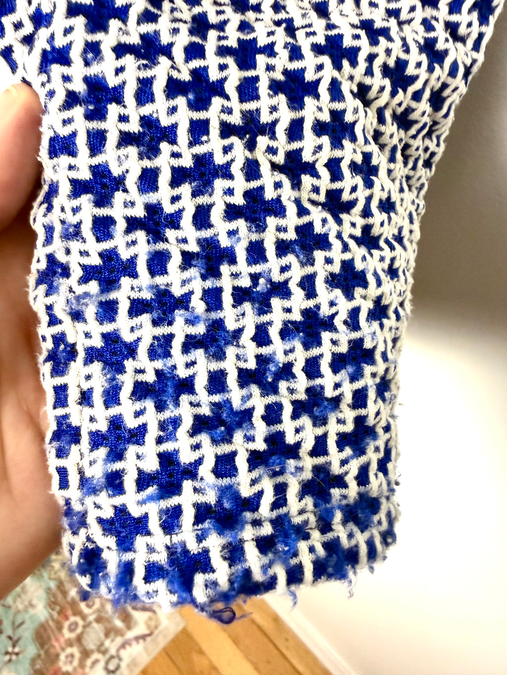 wear shown in one area of Zara Trafaluc blue white boucle sleeveless tank front view