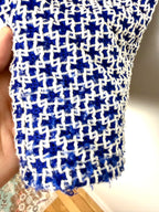 wear shown in one area of Zara Trafaluc blue white boucle sleeveless tank front view