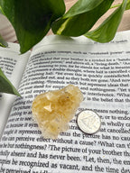 fluorite - yellow - on book with dime for scale 