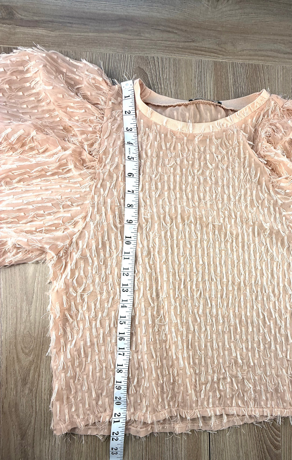 Zara feathery top measuring 21" from shoulder to hem 