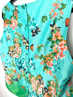 back button detailing on butterfly patterned blouse by Linea Domani 
