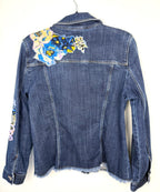 back decal detail on Chicos embroidered denim jacket 