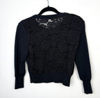 back lace detail on 60's style Karl Lagerfeld Paris black knit cardigan 