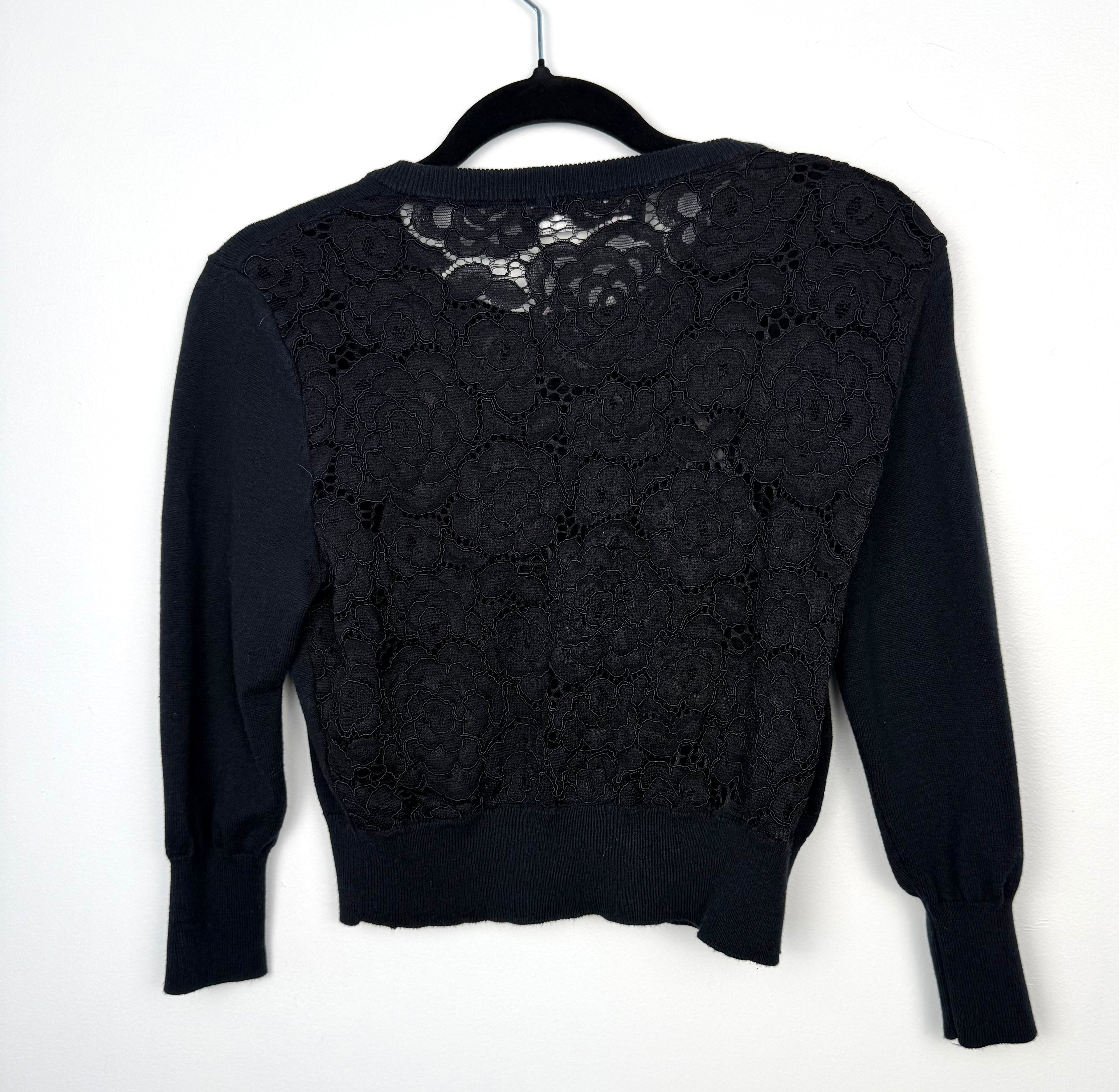 back lace detail on 60's style Karl Lagerfeld Paris black knit cardigan 