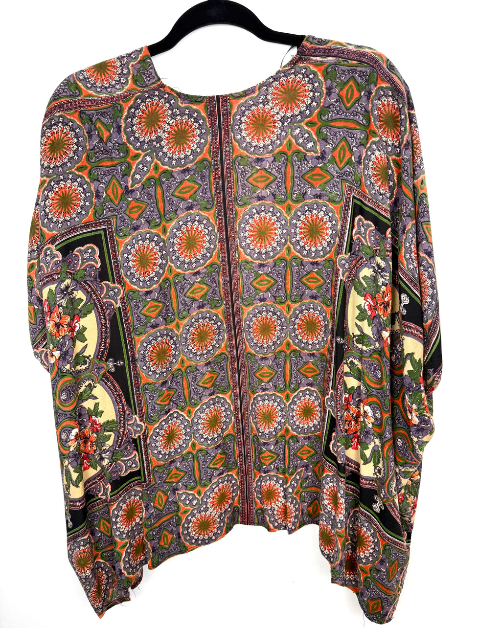 back of Angie boho medallion print kimono in earth tones on hanger