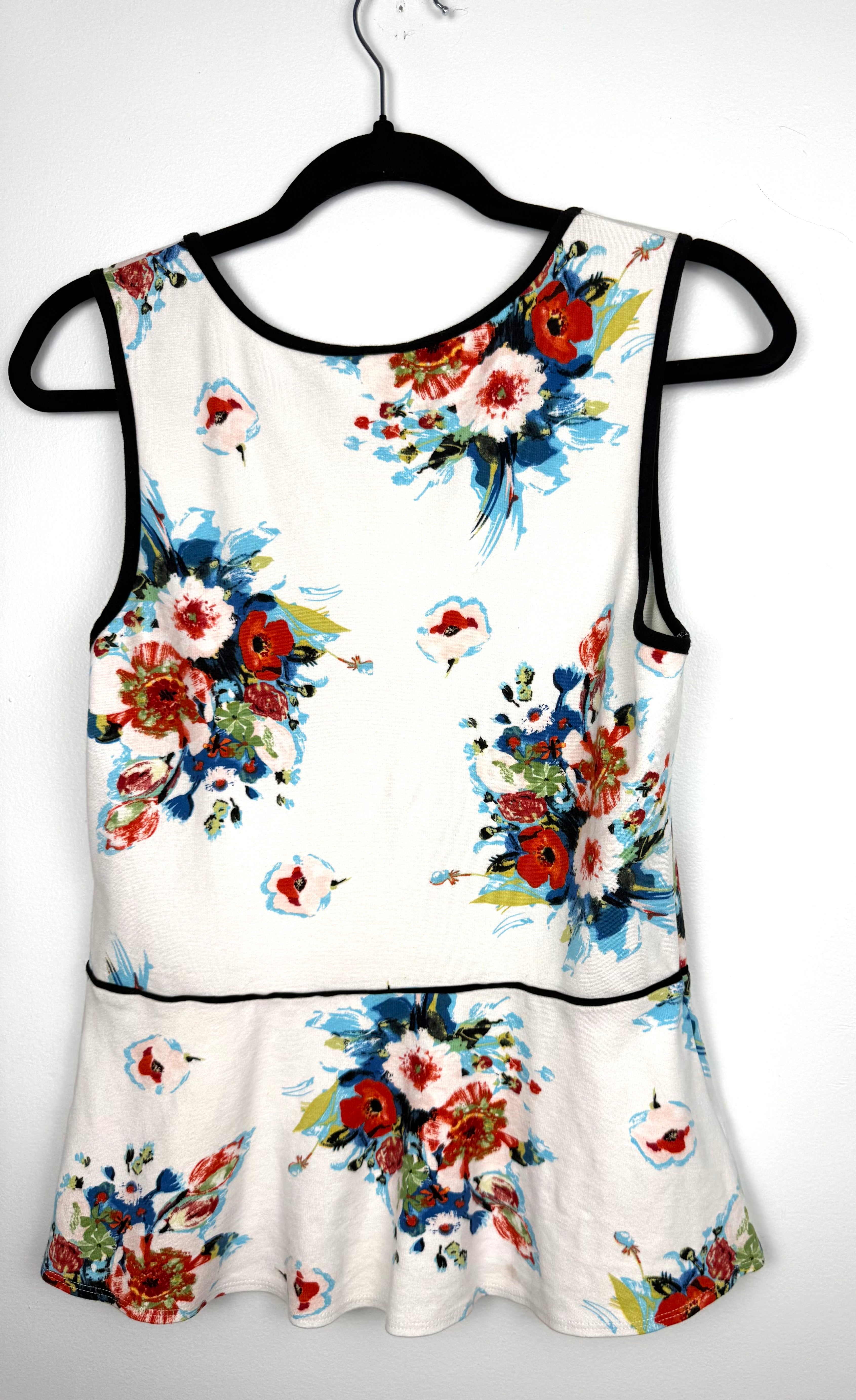 back of Anthropologie Deletta Peplum Tank Top on hanger