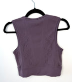 back of Athleta cropped workout tank Purple Athleta yoga top  on hanger