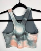back of Athleta tie dye  Sports Bra Crop Top on hanger